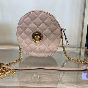 Brand new versace luxurious shoulder bag crafted in calfskin leather in pink